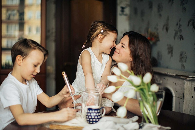Happy Woman with her Family